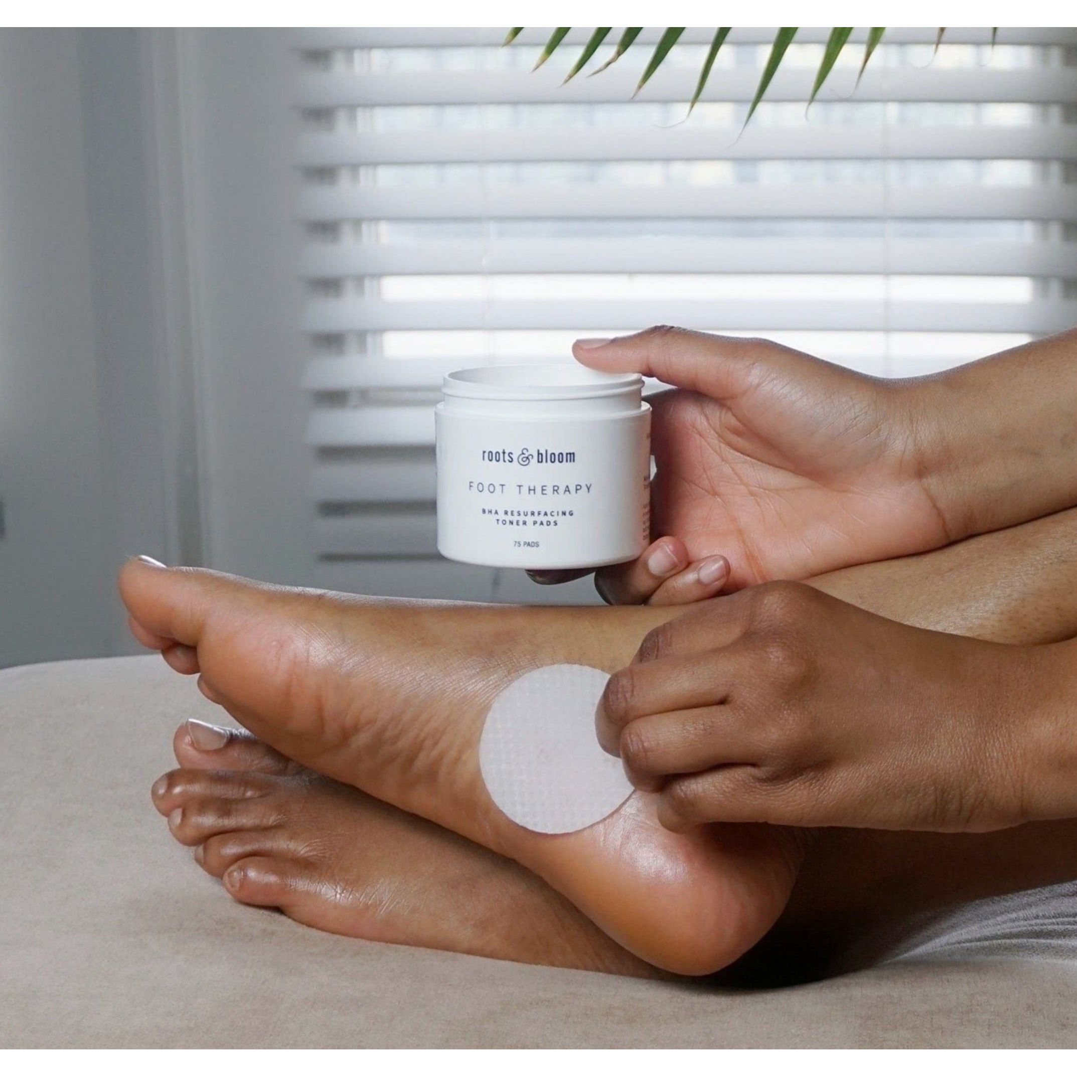 Exfoliating Peel Pad being applied to feet
