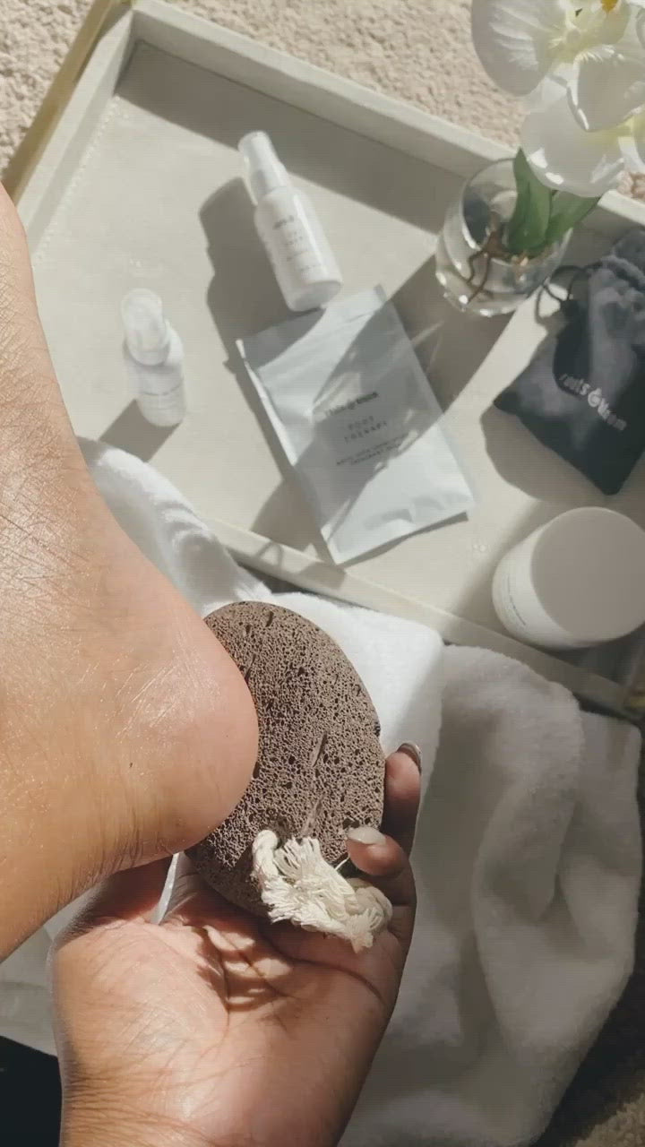 Applying Pumice Stone to Feet